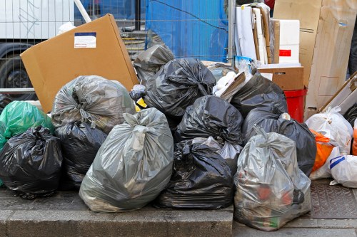 Professional waste clearance team handling construction debris