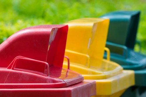Recyclables separated into different bins at a commercial clearance site